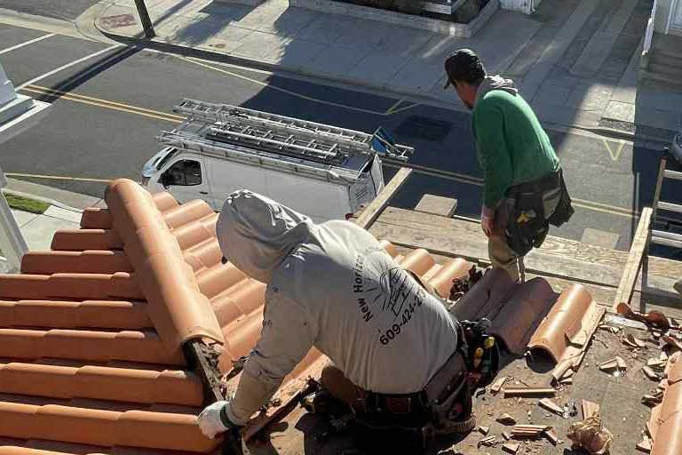 From Terracotta Tile to Metal: A Coastal Roof Transformation in Longport, NJ project photo 4